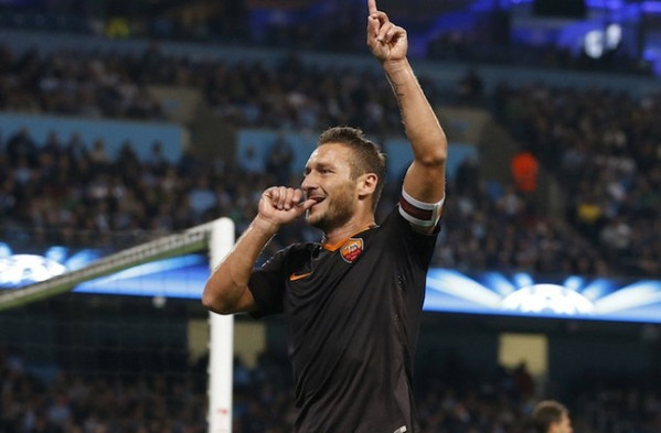 as-romas-totti-celebrates-scoring-a-goal-against-manchester-city-during-their-champions-league-soccer-match-at-the-etihad-stadium-in-manchester