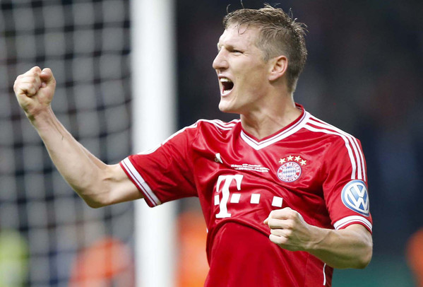 bayern-munichs-schweinsteiger-celebrates-victory-over-vfb-stuttgart-in-their-german-soccer-cup-dfb-pokal-final-match-at-the-olympic-stadium-in-berlin