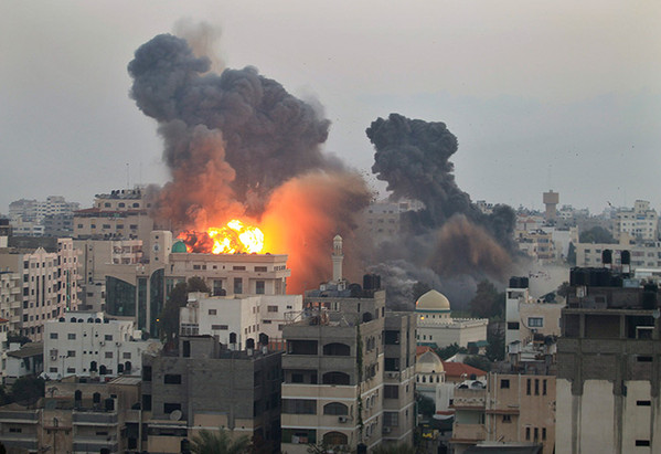 smoke-and-fire-from-an-israeli-bomb-rises-into-the-air-ove-gaza-city